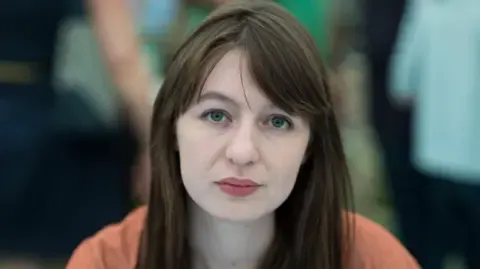 The acclaimed novelist claims she will not visit the UK due to potential arrest